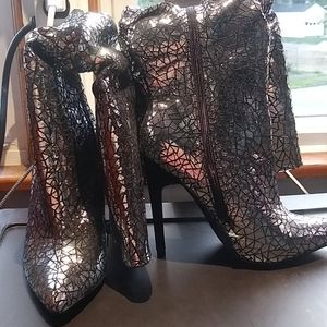New silver knee high boots